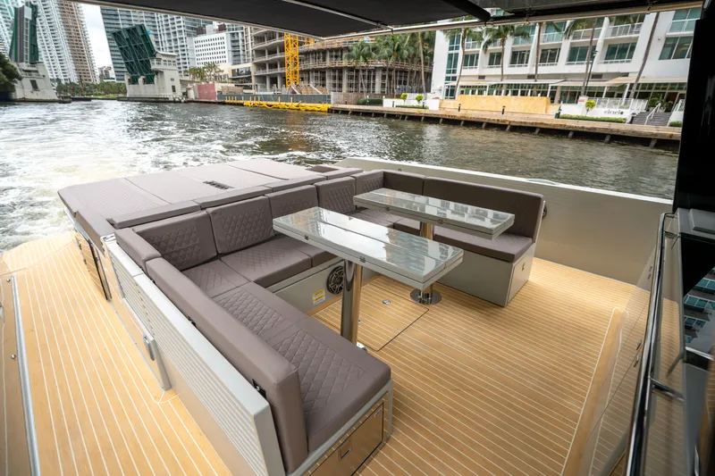  Yacht Photos Pics Luxurious seating area on 2025 De Antonio Yachts D42 Open, featuring sleek design and waterfront view.