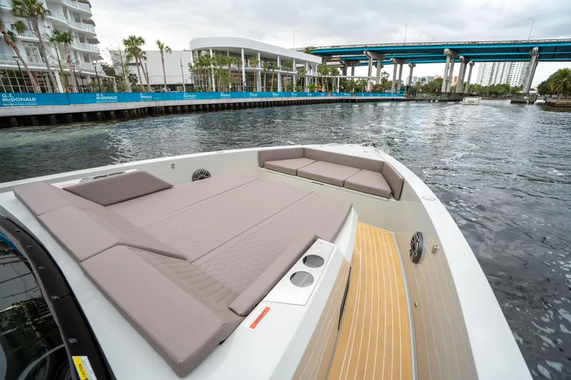  Yacht Photos Pics 2025 De Antonio Yachts D42 Open, luxurious deck view, modern waterfront setting.