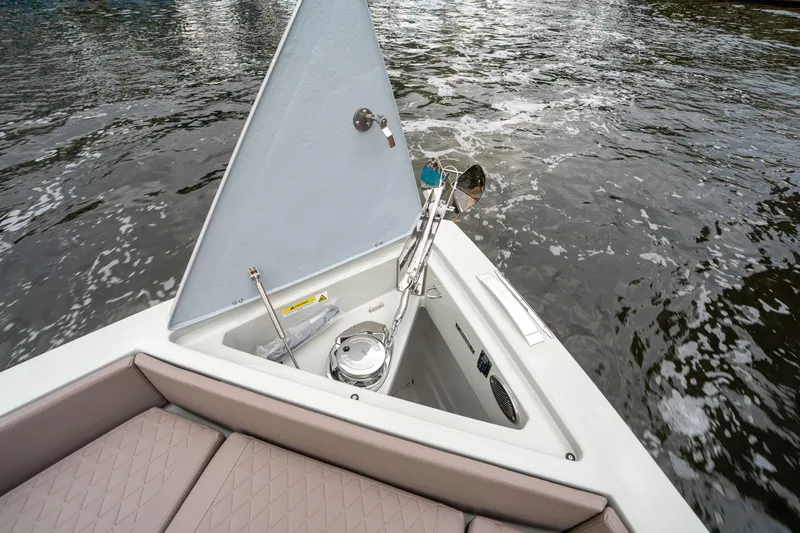  Yacht Photos Pics 2025 De Antonio Yachts D42 Open anchor compartment with water view.