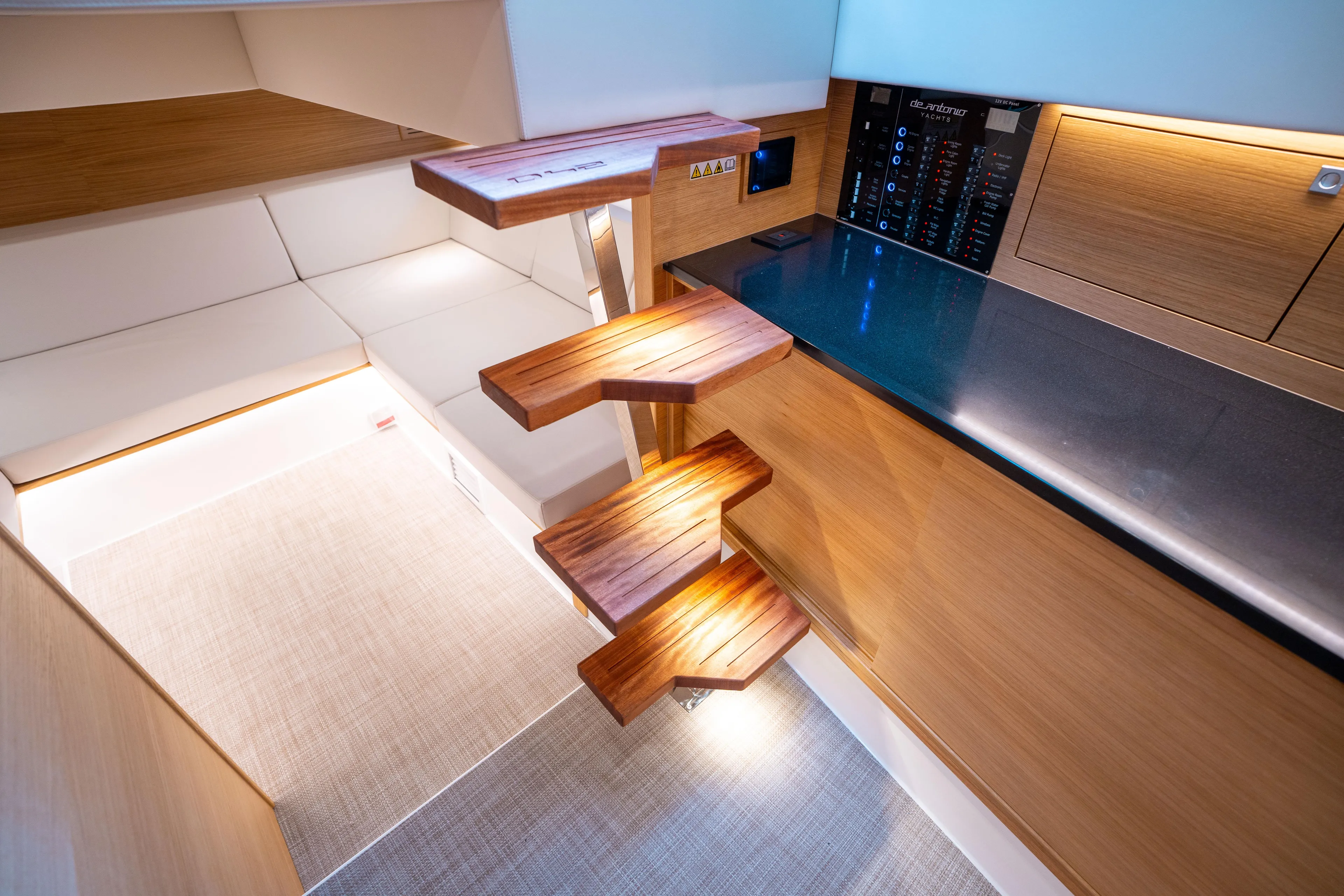  Yacht Photos Pics Interior of 2025 De Antonio Yachts D42 Open, featuring modern wooden steps and sleek design.