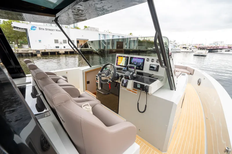  Yacht Photos Pics 2025 De Antonio Yachts D42 Open cockpit with modern navigation equipment and luxurious seating.