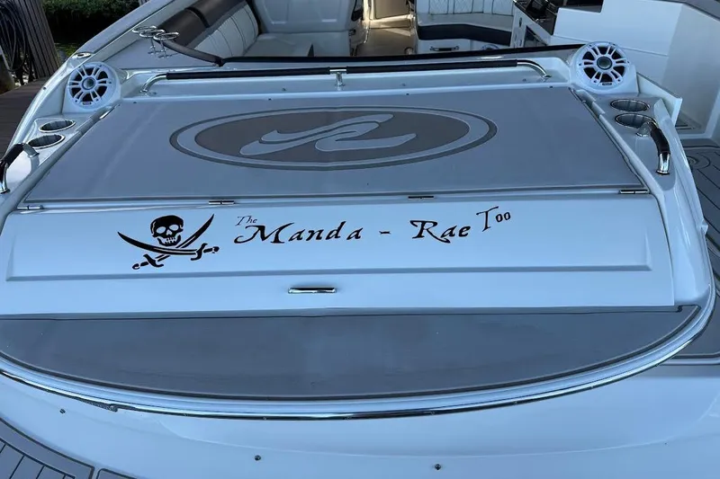 Manda Rae Too Yacht Photos Pics 2018 Sae Ray 38SLV OB boat with custom pirate-themed nameplate "The Manda - Rae Too."