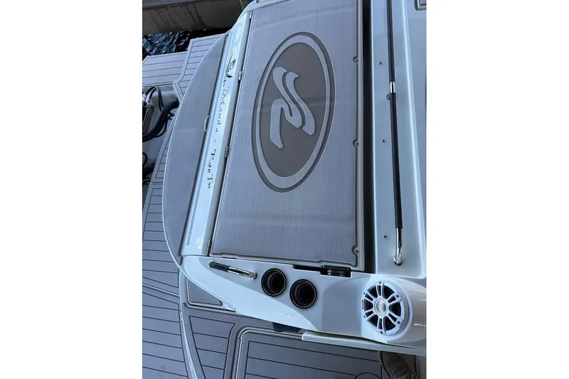 Manda Rae Too Yacht Photos Pics 2018 Sae Ray 38SLV OB boat deck with logo and speaker detail.