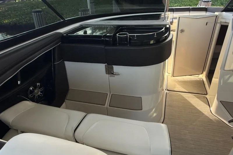 Manda Rae Too Yacht Photos Pics Interior of 2018 Sea Ray 38SLV OB boat with seating and storage compartments.