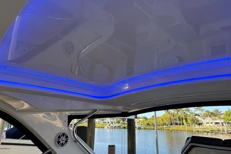 Manda Rae Too Yacht Photos Pics 2018 Sae Ray 38SLV OB boat interior with blue LED lighting and waterfront view.