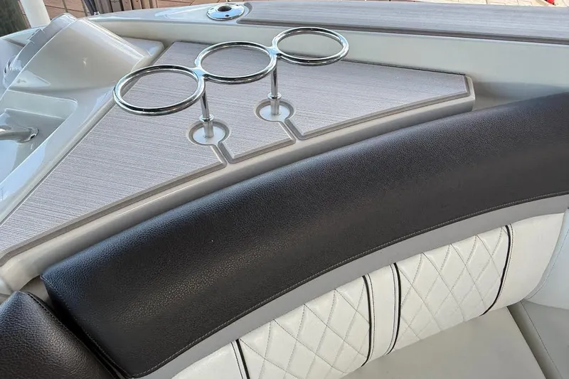 Manda Rae Too Yacht Photos Pics Interior of 2018 Sae Ray 38SLV OB boat with cup holders and quilted seating.