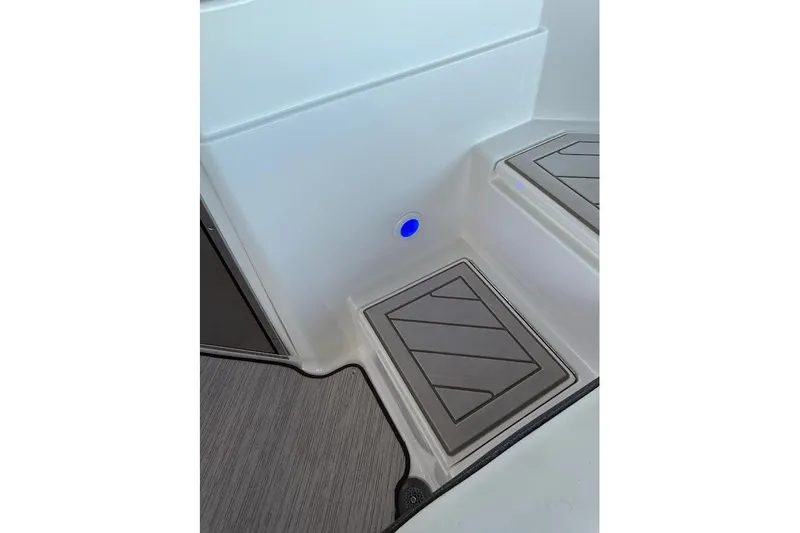 Manda Rae Too Yacht Photos Pics Interior view of 2018 Sae Ray 38SLV OB boat with modern flooring and blue LED light.
