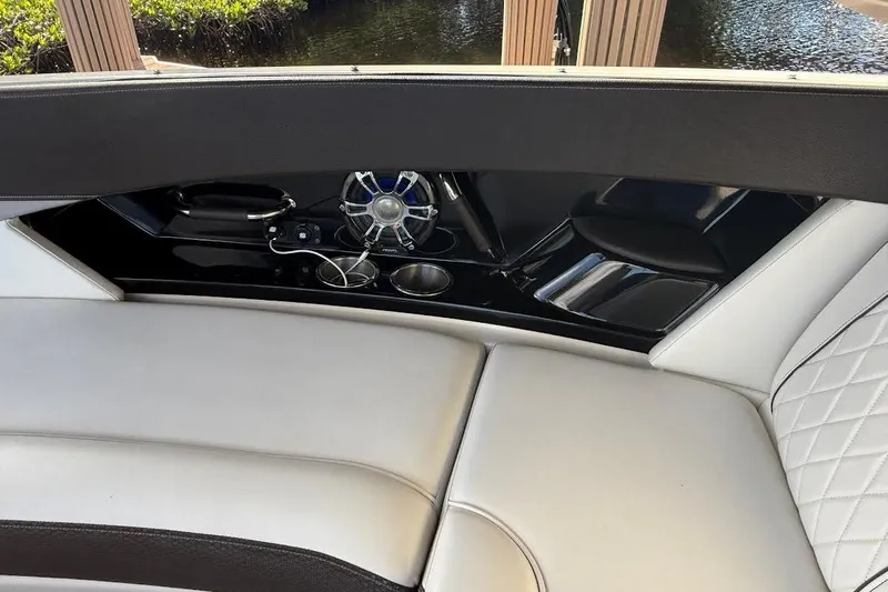 Manda Rae Too Yacht Photos Pics Luxurious interior of 2018 Sea Ray 38SLV OB boat with sleek seating and speaker system.