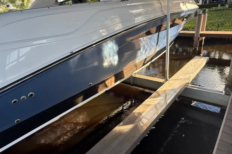 Manda Rae Too Yacht Photos Pics 2018 Sae Ray 38SLV OB boat docked on a sunny day.