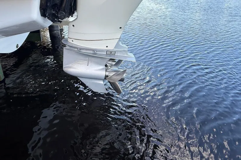 Manda Rae Too Yacht Photos Pics 2018 Sae Ray 38SLV OB outboard motor propeller above water surface.