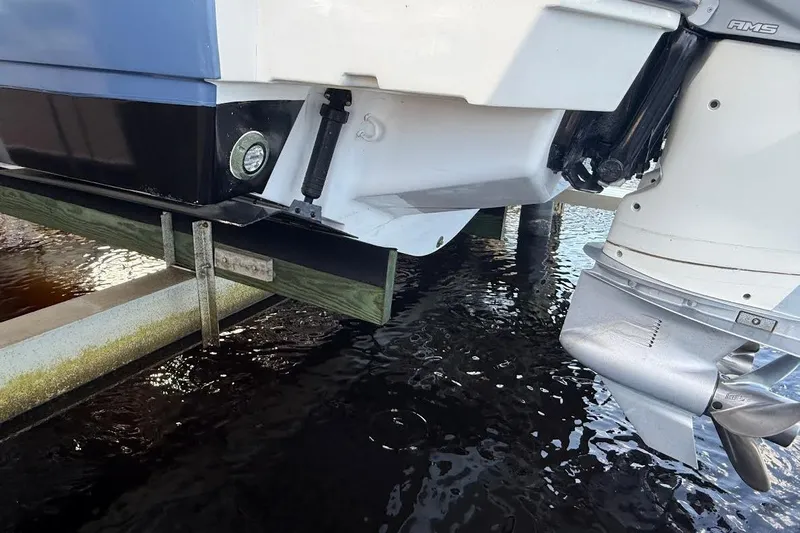 Manda Rae Too Yacht Photos Pics 2018 Sae Ray 38SLV OB boat engine and hull above water.