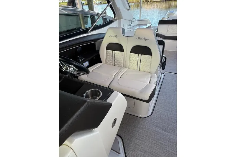 Manda Rae Too Yacht Photos Pics 2018 Sea Ray 38SLV OB boat interior with luxurious helm seating and modern design.