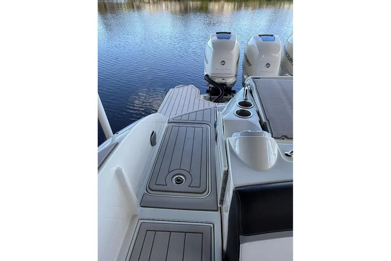 Manda Rae Too Yacht Photos Pics 2018 Sae Ray 38SLV OB boat with twin outboard motors on calm water.