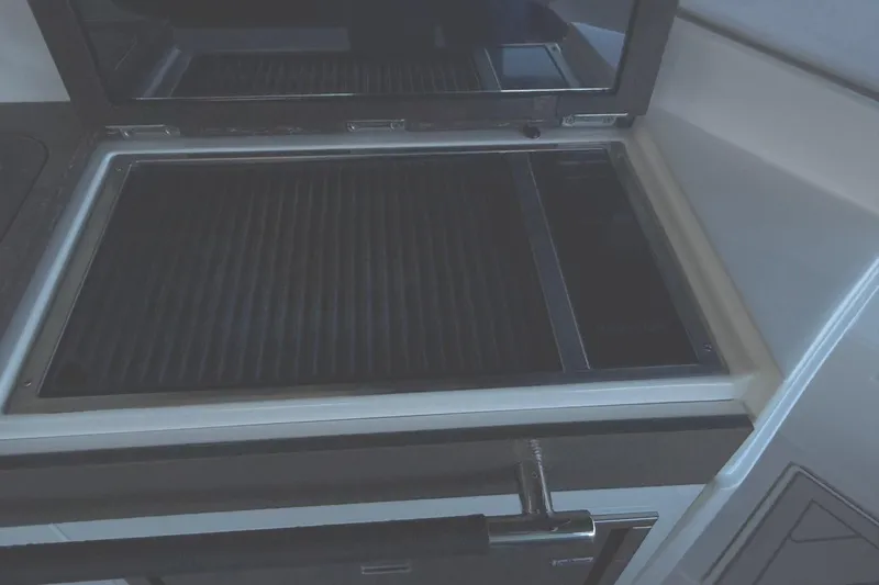 Manda Rae Too Yacht Photos Pics Built-in grill on 2018 Sea Ray 38SLV OB boat, featuring sleek design and functionality.