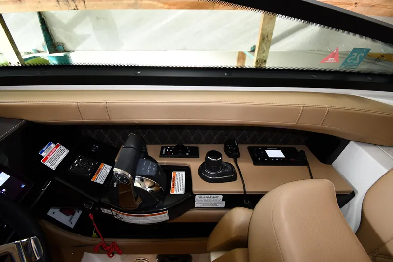  Yacht Photos Pics 2020 Sea Ray SLX 400 Outboard helm with modern controls and beige leather seating.