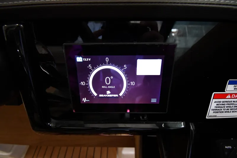  Yacht Photos Pics Digital display on 2020 Sea Ray SLX 400 Outboard showing roll angle and voltage.