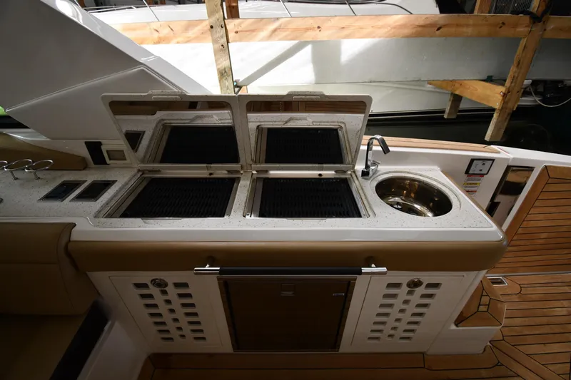  Yacht Photos Pics Outdoor kitchen on 2020 Sea Ray SLX 400 Outboard with grill and sink.