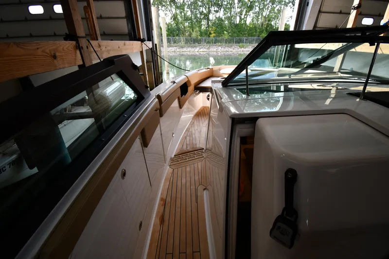  Yacht Photos Pics 2020 Sea Ray SLX 400 Outboard interior with sleek design and wooden flooring.