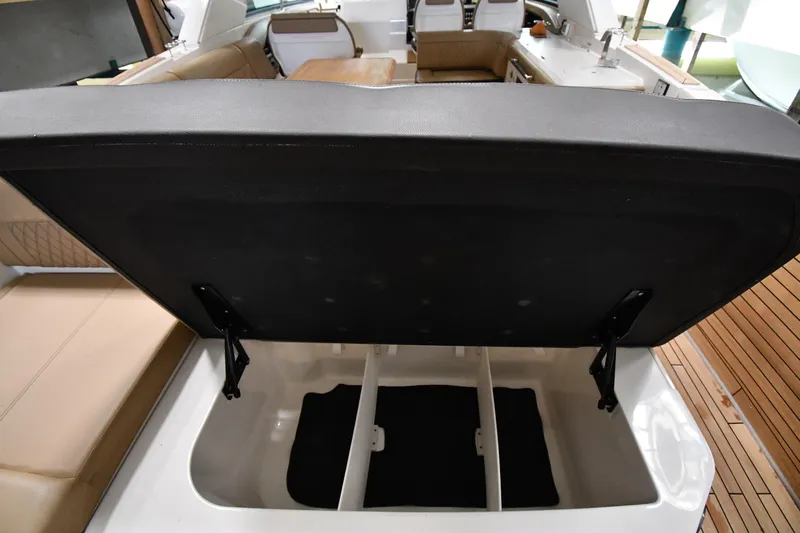  Yacht Photos Pics 2020 Sea Ray SLX 400 Outboard boat interior storage compartment open.