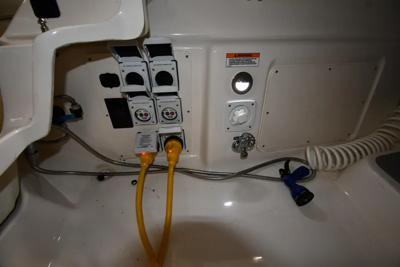  Yacht Photos Pics Electrical and water connections on a 2020 Sea Ray SLX 400 Outboard boat.
