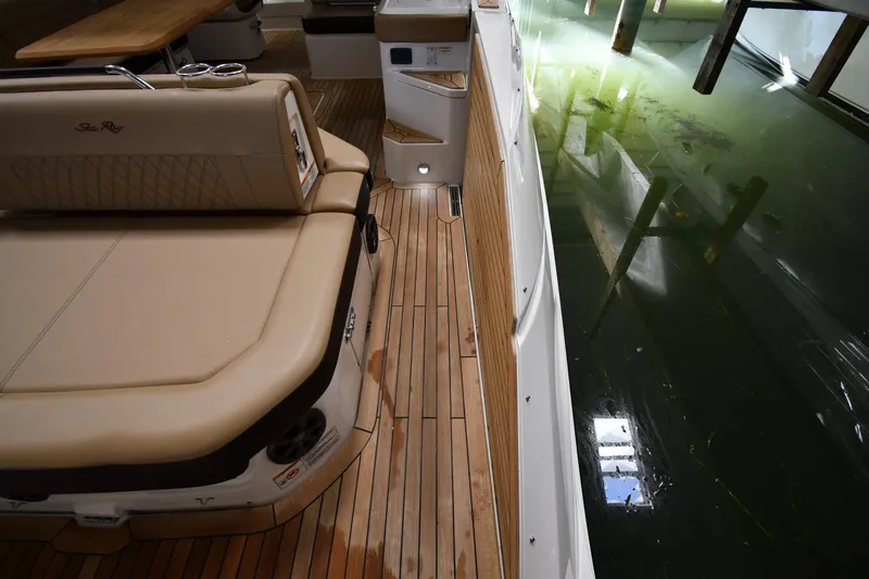  Yacht Photos Pics 2020 Sea Ray SLX 400 Outboard boat interior with teak flooring and water view.