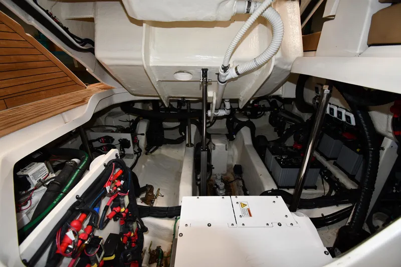  Yacht Photos Pics Engine compartment of 2020 Sea Ray SLX 400 Outboard, showcasing wiring and mechanical components.