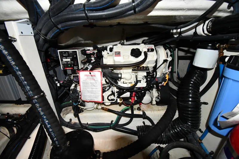  Yacht Photos Pics Engine compartment of 2020 Sea Ray SLX 400 Outboard, showcasing wiring and components.