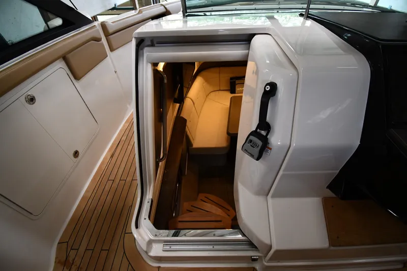  Yacht Photos Pics 2020 Sea Ray SLX 400 Outboard cabin entrance with teak flooring and modern interior.
