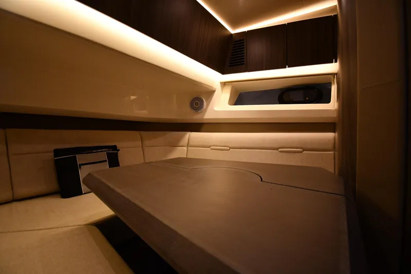  Yacht Photos Pics Luxurious interior cabin of 2020 Sea Ray SLX 400 Outboard with ambient lighting.