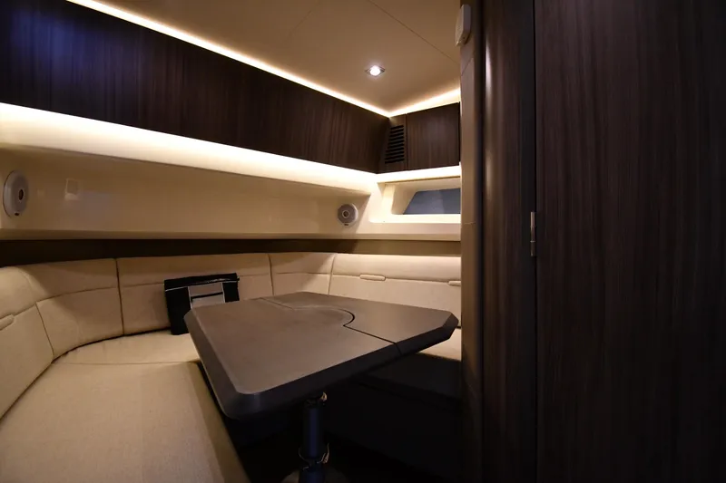  Yacht Photos Pics Luxurious interior of 2020 Sea Ray SLX 400 Outboard with elegant seating and table.