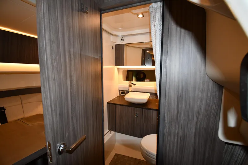  Yacht Photos Pics Luxurious 2020 Sea Ray SLX 400 Outboard cabin interior with modern bathroom design.