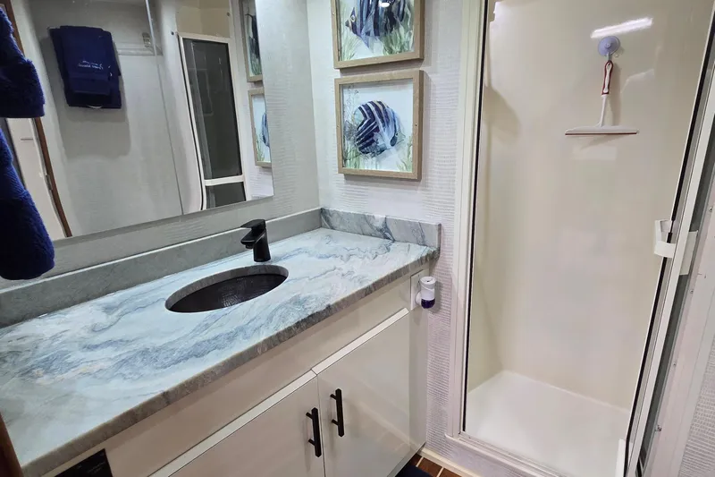 Covert Mission Yacht Photos Pics New Dolomite countertop, sink, facets and flooring in Master head