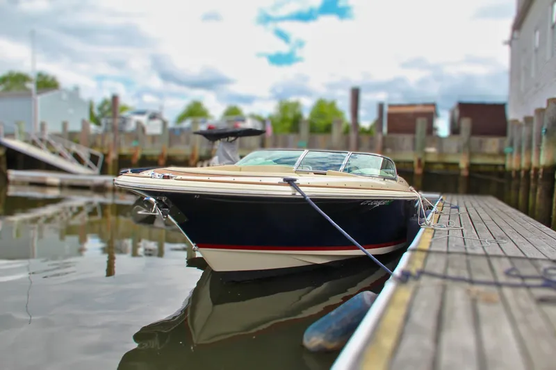 Wahoo Yacht Photos Pics 2013 Chris-Craft Launch 28 boat docked in a marina.