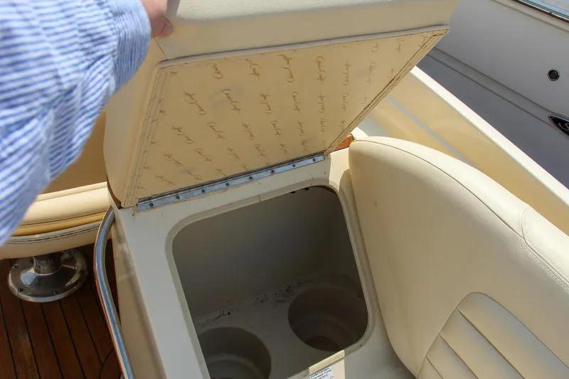 Wahoo Yacht Photos Pics 2013 Chris-Craft Launch 28 boat storage compartment with cup holders.