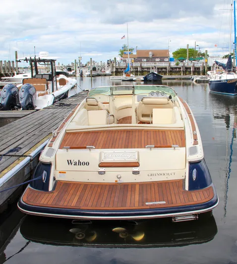 Wahoo Yacht Photos Pics 2013 Chris-Craft Launch 28 boat docked at a marina.