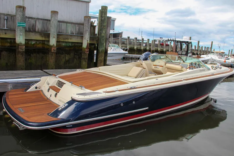 Wahoo Yacht Photos Pics 2013 Chris-Craft Launch 28 boat docked at a marina.
