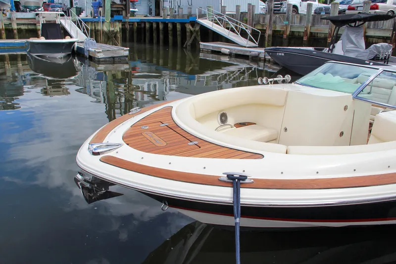 Wahoo Yacht Photos Pics 2013 Chris-Craft Launch 28 boat docked at a marina.