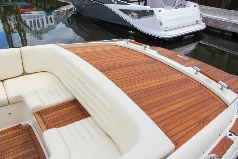 Wahoo Yacht Photos Pics 2013 Chris-Craft Launch 28 boat with teak wood deck and cream seating.