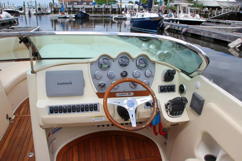 Wahoo Yacht Photos Pics 2013 Chris-Craft Launch 28 boat dashboard with Garmin navigation system at marina.