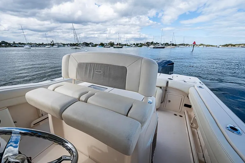 Little P Yacht Photos Pics 2016 Grady-White Canyon 271 FS boat interior with scenic harbor view.
