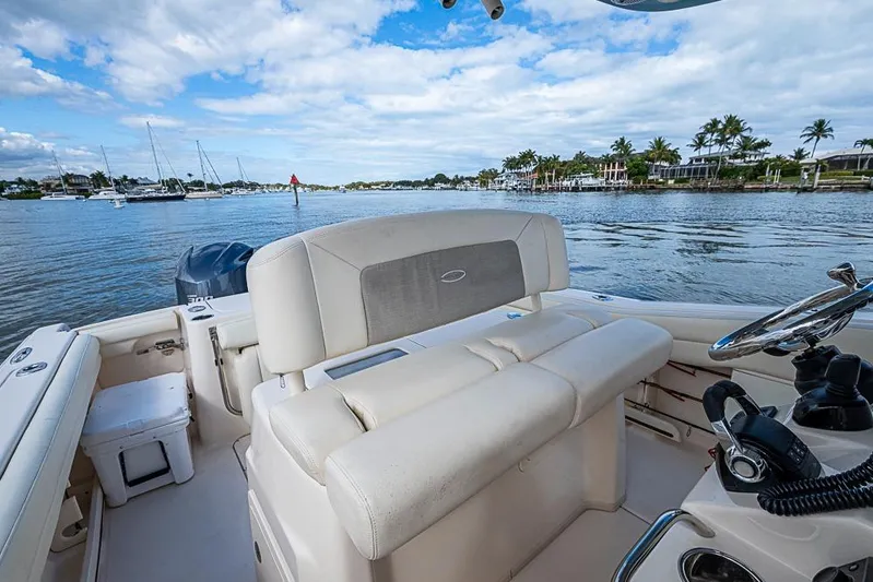 Little P Yacht Photos Pics 2016 Grady-White Canyon 271 FS boat interior with scenic waterfront view.