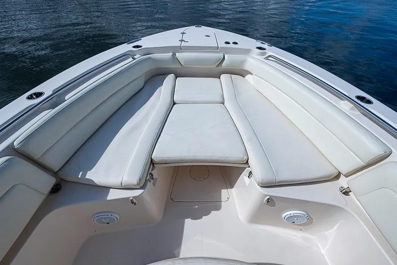 Little P Yacht Photos Pics 2016 Grady-White Canyon 271 FS boat with spacious white seating area.
