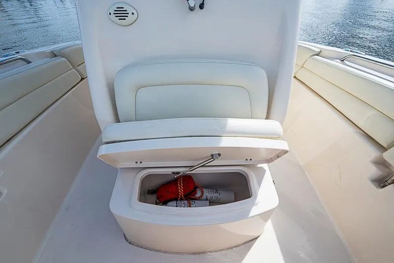 Little P Yacht Photos Pics 2016 Grady-White Canyon 271 FS boat storage compartment with safety equipment.