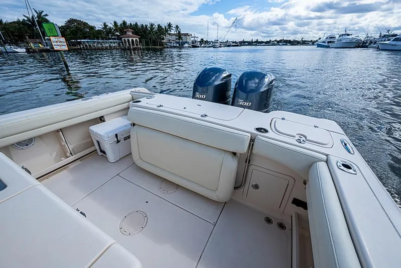 Little P Yacht Photos Pics 2016 Grady-White Canyon 271 FS boat with twin engines on a calm waterway.