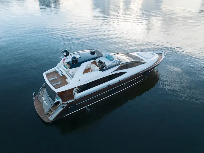  Yacht Photos Pics Aerial view of a 2012 Riva 75 Venere luxury yacht on calm waters.