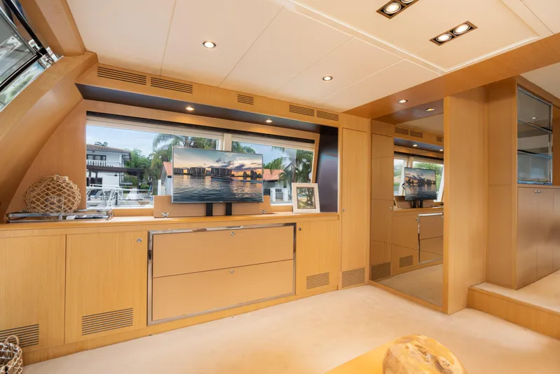  Yacht Photos Pics Luxurious interior of 2012 Riva 75 Venere yacht with modern decor and large windows.