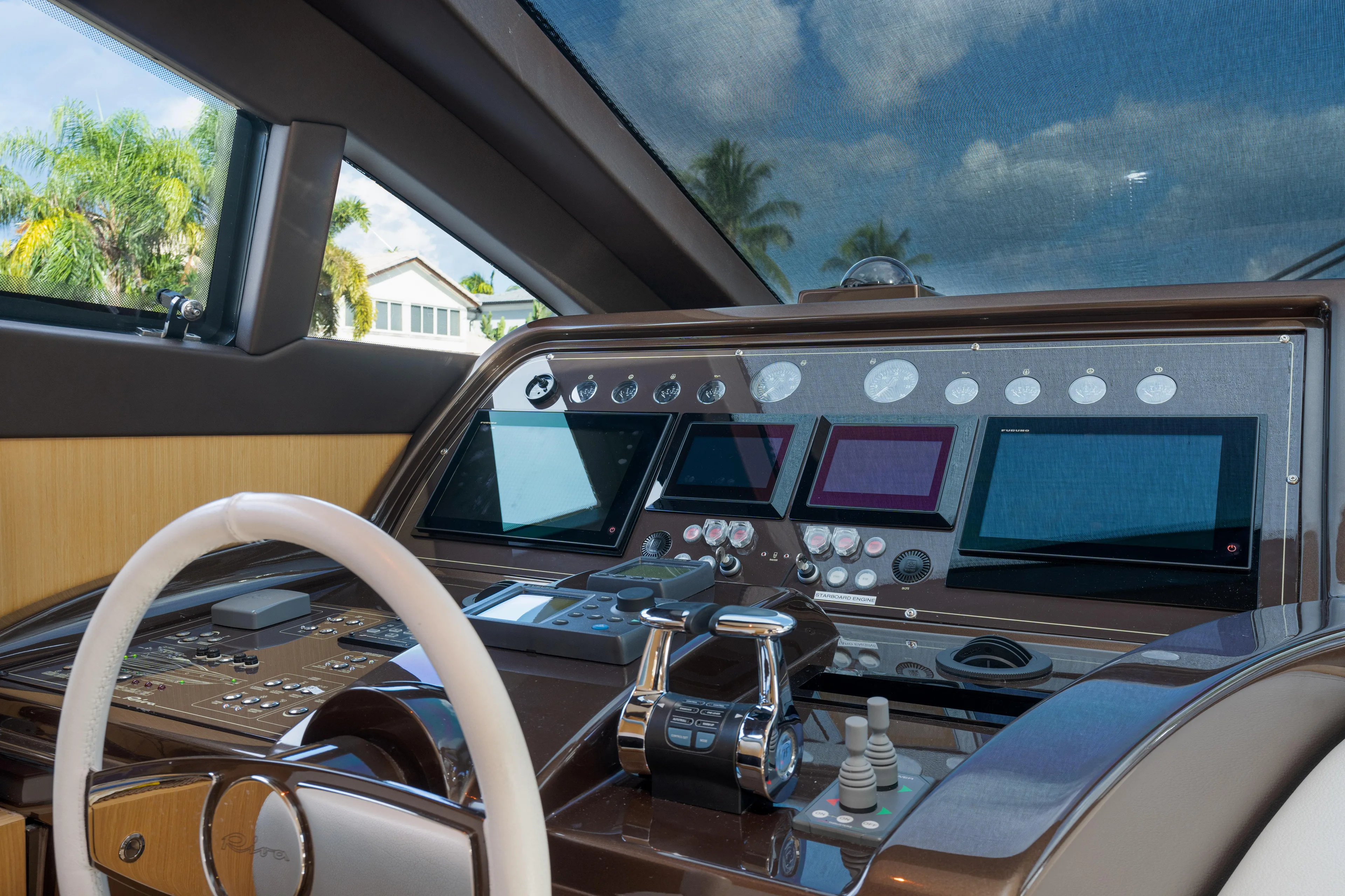  Yacht Photos Pics Cockpit of 2012 Riva 75 Venere yacht with advanced navigation systems.