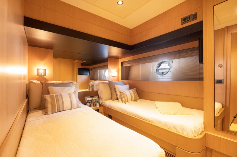  Yacht Photos Pics Luxurious twin cabin interior of 2012 Riva 75 Venere yacht with modern decor.