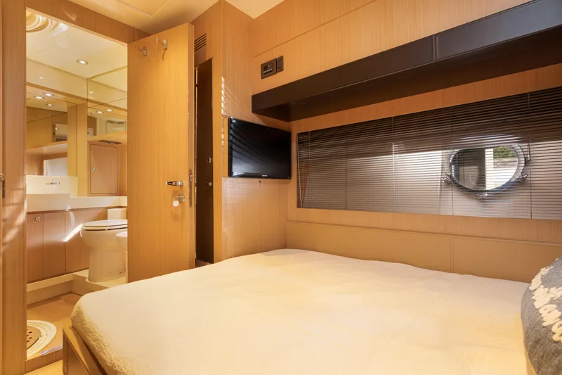  Yacht Photos Pics Luxurious bedroom and bathroom interior of 2012 Riva 75 Venere yacht.