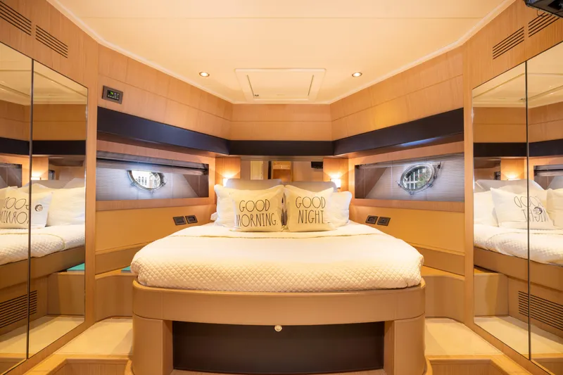  Yacht Photos Pics Luxurious bedroom interior of 2012 Riva 75 Venere yacht with cozy bedding.